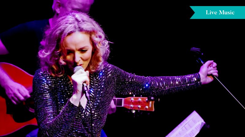 Valentines Jazz 2026 Web Pic Imelda Kehoe singing into a mic during a live music session.