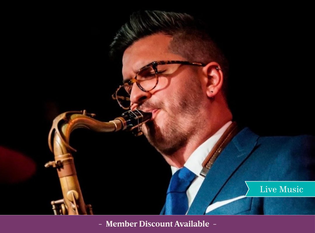 Well known Jazz musician Leo Richardson playing the saxophone live on stage.