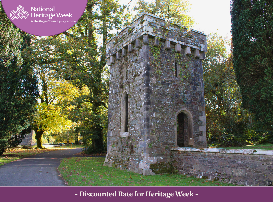 Folly tower at Johnstown Castle Estate surrounded by mature trees.